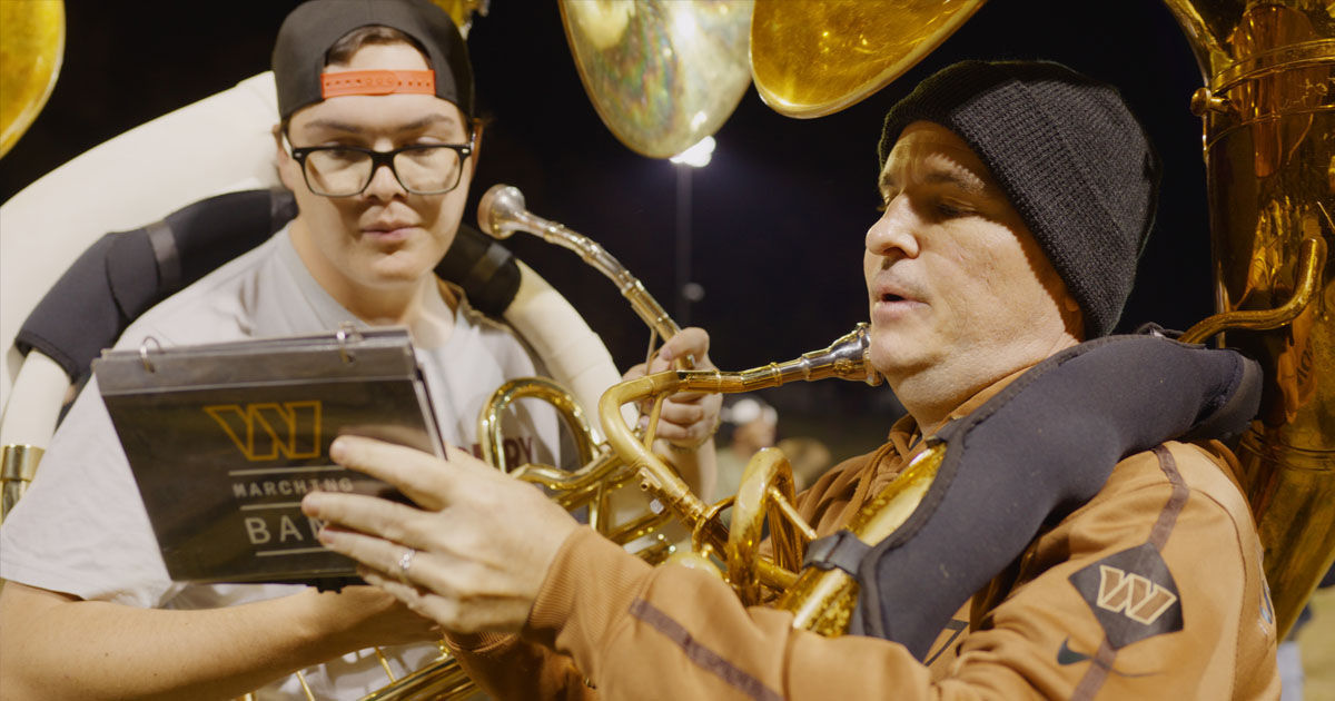 SU's Matt Creech with the Washington Commanders Marching Band